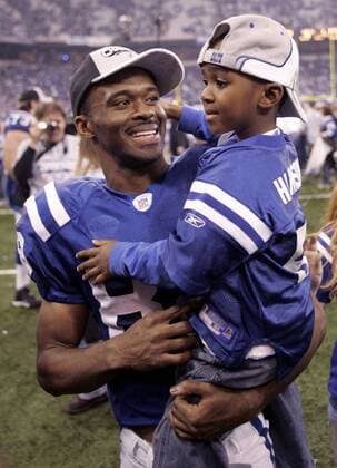 Marvin Harrison (Indianapolis Colts) mit seinem Sohn - (ind2007012147) American Football Herren NFL Conference Championships 2006 2007, AFC, Playoffs, Playoff, Play Offs, Off, Halbfinale Gruppe Indianapolis Freude, American Football Herren NFL Conference Championships 2006 2007, AFC, Playoffs, Playoff, Play Offs, Off, Halbfinale Gruppe Indianapolis Freude,