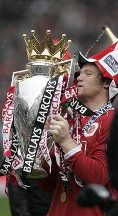 Manchester United ist englischer Meister 2007 - Wayne Rooney feiert mit der Trophäe - EDITORIAL USE ONLY. No use with unauthorised audio, video, data, fixture lists, club league logos or live services. Online in-match use limited to 120 images, no video emulation. No use in betting, games or single club league player publications. Fußball Herren English Premier League 2006 2007, 1. Englische Liga, Manchester United, ManU, Vdig Einzelbild Manchester Freude, Begeisterung, Fußball Herren English Premier League 2006 2007, 1. Englische Liga, Manchester United, ManU, Vdig Einzelbild Manchester Freude, Begeisterung,