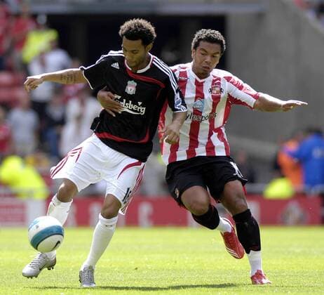 Jermaine Pennant (Liverpool, li.) gegen Kieran Richardson (Sunderland) - EDITORIAL USE ONLY. No use with unauthorised audio, video, data, fixture lists, club league logos or live services. Online in-match use limited to 120 images, no video emulation. No use in betting, games or single club league player publications. Fußball Herren English Premier League 2007 2008, 1. Englische Liga, Sunderland AFC - FC Liverpool 0:2, FC, Vdig Gruppe Sunderland Dynamik, Kampf, Fußball Herren English Premier League 2007 2008, 1. Englische Liga, Sunderland AFC - FC Liverpool 0:2, FC, Vdig Gruppe Sunderland Dynamik, Kampf,