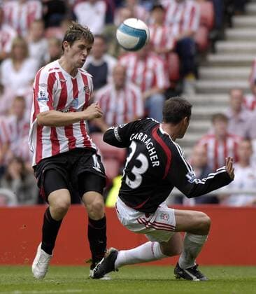 Daryl Murphy (Sunderland, li.) gegen Jamie Carragher (Liverpool) - EDITORIAL USE ONLY. No use with unauthorised audio, video, data, fixture lists, club league logos or live services. Online in-match use limited to 120 images, no video emulation. No use in betting, games or single club league player publications. Fußball Herren English Premier League 2007 2008, 1. Englische Liga, Sunderland AFC - FC Liverpool 0:2, FC, Vdig Gruppe Sunderland Dynamik, Fußball Herren English Premier League 2007 2008, 1. Englische Liga, Sunderland AFC - FC Liverpool 0:2, FC, Vdig Gruppe Sunderland Dynamik,