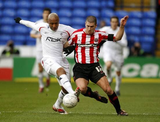 El Hadji Diouf (Bolton, li.) gegen Nick Montgomery (Sheffield United) - EDITORIAL USE ONLY. No use with unauthorised audio, video, data, fixture lists, club league logos or live services. Online in-match use limited to 120 images, no video emulation. No use in betting, games or single club league player publications. Fußball Herren FA Cup 2007 2008, Englischer Pokal, Pokalspiel, Bolton Wanderers - Sheffield United 0:1 Gruppe Bolton Dynamik, Kampf, Fußball Herren FA Cup 2007 2008, Englischer Pokal, Pokalspiel, Bolton Wanderers - Sheffield United 0:1 Gruppe Bolton Dynamik, Kampf,