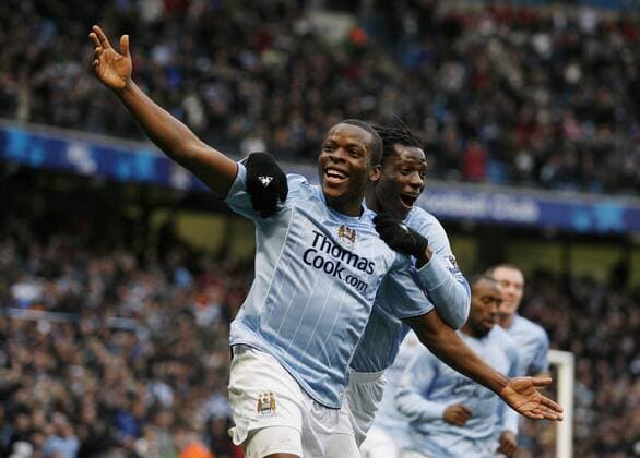 Nedum Onuoha (li.) und Mwaruwari Benjani (beide Manchester City) - Torjubel - EDITORIAL USE ONLY. No use with unauthorised audio, video, data, fixture lists, club league logos or live services. Online in-match use limited to 120 images, no video emulation. No use in betting, games or single club league player publications. Fußball Herren English Premier League 2007 2008, 1. Englische Liga, Manchester City Gruppe Manchester Freude, Fußball Herren English Premier League 2007 2008, 1. Englische Liga, Manchester City Gruppe Manchester Freude,