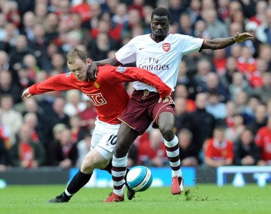 Emmanuel Eboue (Arsenal, re.) gegen Wayne Rooney (Manchester United) - EDITORIAL USE ONLY. No use with unauthorised audio, video, data, fixture lists, club league logos or live services. Online in-match use limited to 120 images, no video emulation. No use in betting, games or single club league player publications. Fußball Herren English Premier League 2007 2008, 1. Englische Liga, Manchester United - Arsenal FC London, ManU Gruppe Manchester Dynamik, Fußball Herren English Premier League 2007 2008, 1. Englische Liga, Manchester United - Arsenal FC London, ManU Gruppe Manchester Dynamik,