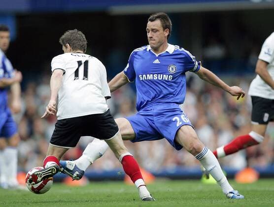 John Terry (Chelsea, re.) gegen Zoltan Gera (Fulham) - EDITORIAL USE ONLY. No use with unauthorised audio, video, data, fixture lists, club league logos or live services. Online in-match use limited to 120 images, no video emulation. No use in betting, games or single club league player publications. Fußball Herren English Premier League 2008 2009, 1. Englische Liga, FC Chelsea London - FC Fulham 3:1 Gruppe London Dynamik,