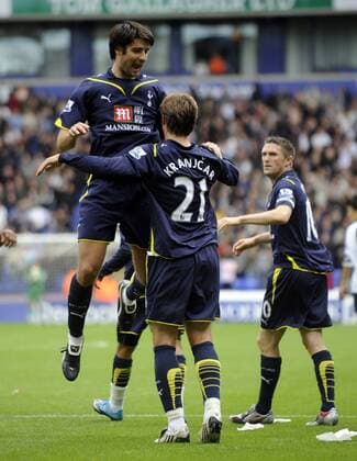 Tottenham s Vedran Corluka (L) celebrates with goalscorer Niko Kranjcar. EDITORIAL USE ONLY. No use with unauthorised audio, video, data, fixture lists, club league logos or live services. Online in-match use limited to 120 images, no video emulation. No use in betting, games or single club league player publications. o0 Jubel, Freude, Tottenham Hotspur, Hotspurs, Spurs