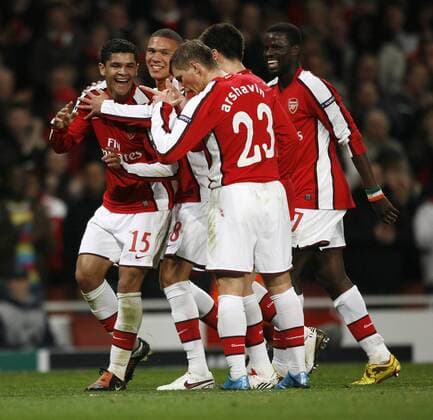 Arsenal s Denilson (L) celebrates scoring his sides second goal UEFA Champions League Group H Arsenal v Standard Liege 24th November, 2009 EDITORIAL USE ONLY. No use with unauthorised audio, video, data, fixture lists, club league logos or live services. Online in-match use limited to 120 images, no video emulation. No use in betting, games or single club league player publications. o0 FC London, Jubel, Freude,