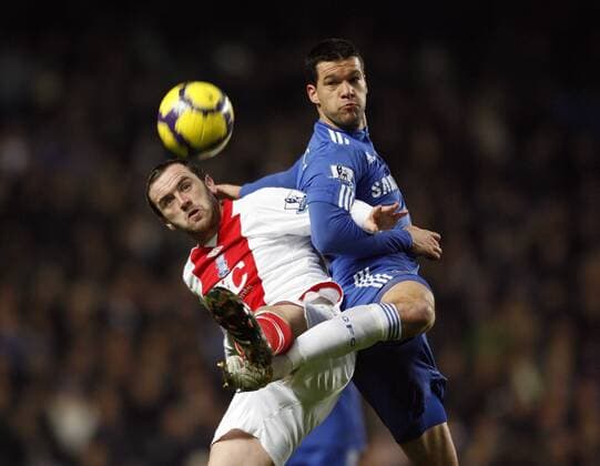 Chelsea s Michael Ballack (R) tussles with Birmingham s James McFadden , Barclays Premier League, Chelsea FC London - Birmingham City, 27th January, 2010 - EDITORIAL USE ONLY. No use with unauthorised audio, video, data, fixture lists, club league logos or live services. Online in-match use limited to 120 images, no video emulation. No use in betting, games or single club league player publications. o0 Mc Fadden