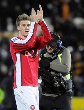 Arsenal s Nicklas Bendtner celebrates at the ending whistle. --- Barclays Premier League: Hull City (orange) vs FC Arsenal London (red) 13th March, 2010 EDITORIAL USE ONLY. No use with unauthorised audio, video, data, fixture lists, club league logos or live services. Online in-match use limited to 120 images, no video emulation. No use in betting, games or single club league player publications. o0 Jubel Freude