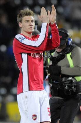 Arsenal s Nicklas Bendtner celebrates at the ending whistle. --- Barclays Premier League: Hull City (orange) vs FC Arsenal London (red) 13th March, 2010 EDITORIAL USE ONLY. No use with unauthorised audio, video, data, fixture lists, club league logos or live services. Online in-match use limited to 120 images, no video emulation. No use in betting, games or single club league player publications. o0 Jubel Freude