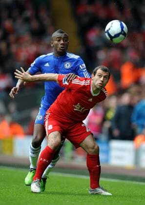 Javier Mascherano (R) of Liverpool holds off Salomon Kalou of Chelsea , Barclays Premier League, FC Liverpool v Chelsea FC London, 2nd May, 2010 EDITORIAL USE ONLY. No use with unauthorised audio, video, data, fixture lists, club league logos or live services. Online in-match use limited to 120 images, no video emulation. No use in betting, games or single club league player publications.
