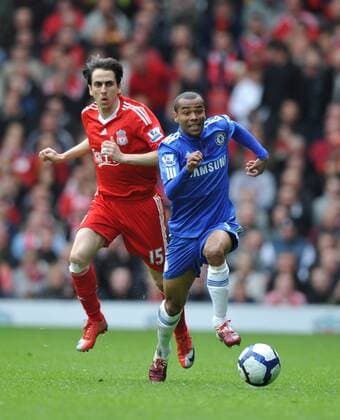 Ashley Cole (R) of Chelsea and Yossi Benayoun of Liverpool , Barclays Premier League, FC Liverpool v Chelsea FC London, 2nd May, 2010 EDITORIAL USE ONLY. No use with unauthorised audio, video, data, fixture lists, club league logos or live services. Online in-match use limited to 120 images, no video emulation. No use in betting, games or single club league player publications.