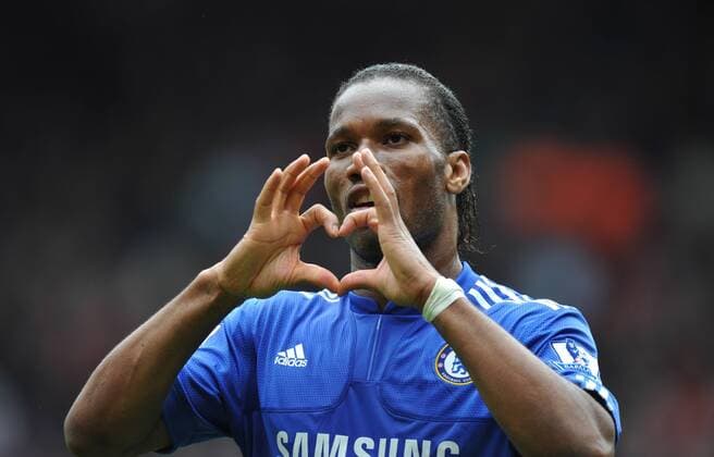 Didier Drogba of Chelsea shows a heart sign to the Chelsea fans at the end of the match , Barclays Premier League, FC Liverpool v Chelsea FC London, 2nd May, 2010 EDITORIAL USE ONLY. No use with unauthorised audio, video, data, fixture lists, club league logos or live services. Online in-match use limited to 120 images, no video emulation. No use in betting, games or single club league player publications. o0 Jubel, Freude Herz