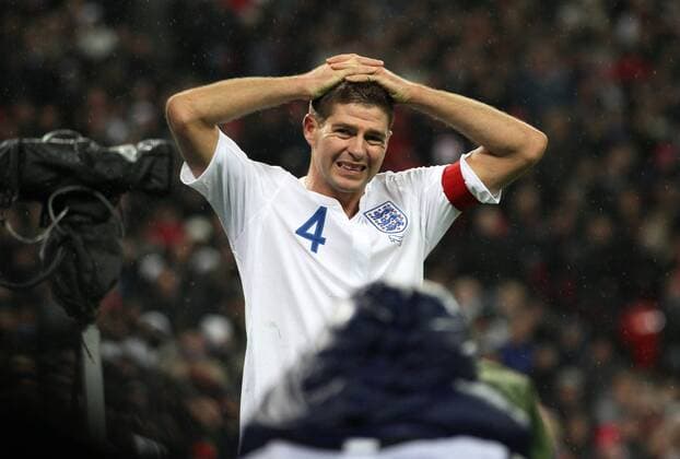 Englands Steven Gerrard looks on dejected - England (white) vs. France (blue) 1:2 EDITORIAL USE ONLY. No use with unauthorised audio, video, data, fixture lists, club league logos or live services. Online in-match use limited to 120 images, no video emulation. No use in betting, games or single club league player publications.
