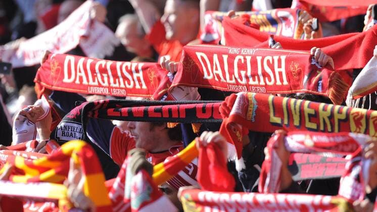 Coach Kenny Dalglish scarves held aloft by Liverpool FC fans Barclays Premier League 2011 EDITORIAL USE ONLY. No use with unauthorised audio, video, data, fixture lists, club league logos or live services. Online in-match use limited to 120 images, no video emulation. No use in betting, games or single club league player publications. o0 Fan, Publikum, Schal, Fanschal, Objekte, Schriftzug
