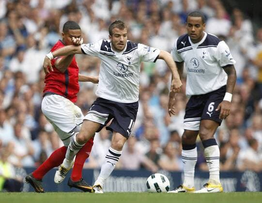 Rafael van der Vaart (C) of Tottenham Hotspur gets away from Jerome Thomas of West Bromwich Albion during the English Premier League football match between Tottenham Hotspur and West Bromwich Albion at White Hart Lane, London, England, on April 23, 2011. Photo Credit SPORTIMAGE JAKE BADGER Barclays Premier League, Tottenham Hotspur v West Bromwich Albion 23rd April, 2011 EDITORIAL USE ONLY. No use with unauthorised audio, video, data, fixture lists, club league logos or live services. Online in-match use limited to 120 images, no video emulation. No use in betting, games or single club league player publications.
