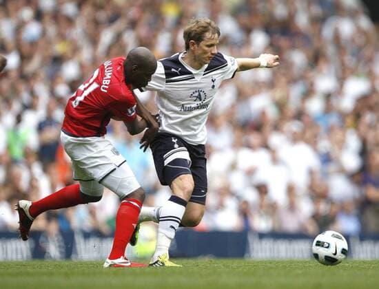 Roman Pavlyuchenko (R) of Tottenham Hotspur holds off Youssuf Mulumbu of West Bromwich Albion during the English Premier League football match between Tottenham Hotspur and West Bromwich Albion at White Hart Lane, London, England, on April 23, 2011. Photo Credit SPORTIMAGE JAKE BADGER Barclays Premier League, Tottenham Hotspur v West Bromwich Albion 23rd April, 2011 EDITORIAL USE ONLY. No use with unauthorised audio, video, data, fixture lists, club league logos or live services. Online in-match use limited to 120 images, no video emulation. No use in betting, games or single club league player publications.