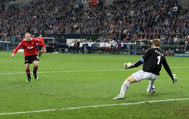 Manchester United s Wayne Rooney scoring his sides second goal vs Manuel Neuer of Schalke - FC Schalke 04 (blue) - Manchester United (ManU) - EDITORIAL USE ONLY. No use with unauthorised audio, video, data, fixture lists, club league logos or live services. Online in-match use limited to 120 images, no video emulation. No use in betting, games or single club league player publications.