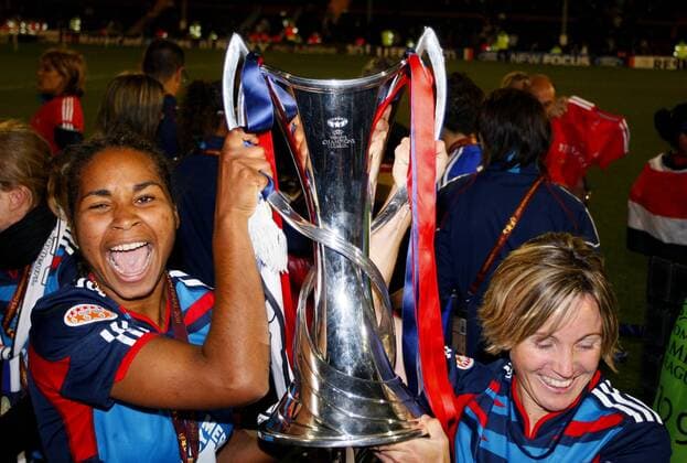 Laura Georges of Olympique Lyonnais lifts the UEFA Women s Champions League trophy after the UEFA Women s Champions League final football match between Olympique Lyonnais and FFC Turbine Potsdam at Craven Cottage, London, England, on May 26, 2011. Photo Credit SPORTIMAGE JAKE BADGER UEFA Women s Champions League Final Olympique Lyonnais v Potsdam 26th May, 2011 EDITORIAL USE ONLY. No use with unauthorised audio, video, data, fixture lists, club league logos or live services. Online in-match use limited to 120 images, no video emulation. No use in betting, games or single club league player publications.