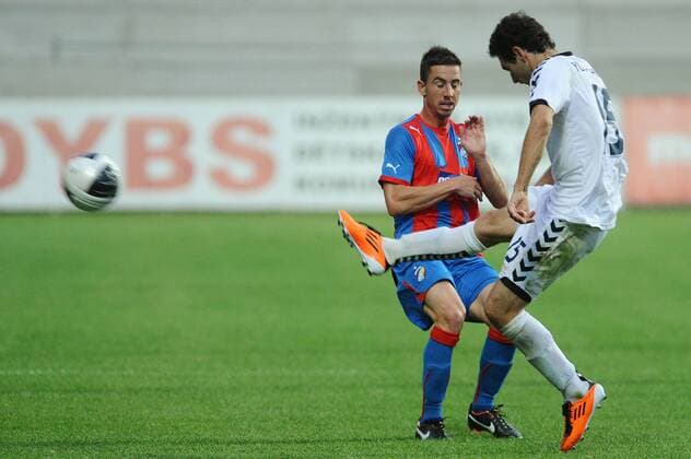 Champions League 2. qualification match Viktoria Pilsen against Pyunik Yerevan on July 19, 2011 in Pilsen, Czech Republic. Pictured Artur Yuspashyan, Milan Petrzela. (CTKxPhoto PavelxRakusan) CTKPhoto201107190368901