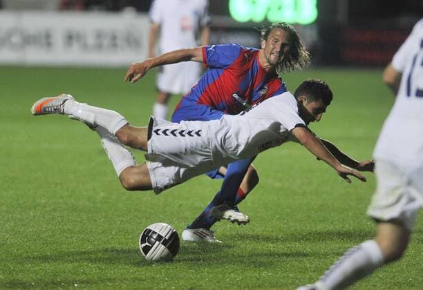 Champions League 2. qualification match Viktoria Pilsen against Pyunik Yerevan on July 19, 2011 in Pilsen, Czech Republic. Pictured Petr Jiracek, Gagik Pogosjan. (CTKxPhoto PetrxEret) CTKPhoto4201107190989401