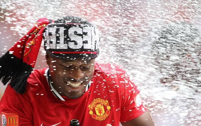 Manchester Uniteds Patrice Evra celebrates - Community Shield - 7th August, 2011 EDITORIAL USE ONLY. No use with unauthorised audio, video, data, fixture lists, club league logos or live services. Online in-match use limited to 120 images, no video emulation. No use in betting, games or single club league player publications. Supercup Super Cup