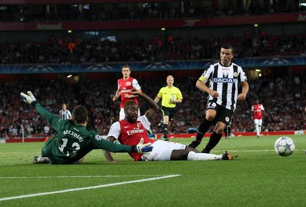 Arsneals Johan Djourou makes a superb block from Udineses Antonio Di Natale then goes off injured UEFA Champions League Qualifying Arsenal FC London v Udinese Calcio 16th August, 2011 EDITORIAL USE ONLY. No use with unauthorised audio, video, data, fixture lists, club league logos or live services. Online in-match use limited to 120 images, no video emulation. No use in betting, games or single club league player publications.