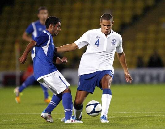 Mirhuseyn Seyidov of Azerbaijan is tackled by Jack Rodwell of England during the Under-21 Euro 2013 qualifying match between England and Azerbaijan at Vicarage Road, Watford, England, on September 1, 2011. Photo Credit SPORTIMAGE JAKE BADGER UEFA Under 21 Championship Qualifying England U21 v Azerbaijan U21 1st September, 2011 EDITORIAL USE ONLY. No use with unauthorised audio, video, data, fixture lists, club league logos or live services. Online in-match use limited to 120 images, no video emulation. No use in betting, games or single club league player publications.