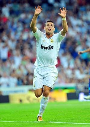 Real Madrid s Cristiano Ronaldo celebrates for goal during the Spanish first division soccer match against Getafe at Santiago Bernabeu stadium in Madrid, Spain, Sept. 10, 2011. Real Madrid won 4-2. (Xinhua Chen Haitong) (bxf) SPAIN-MADRID-SOCCER-FIRST DIVISION MATCH-REAL MADRID VS GETAFE
