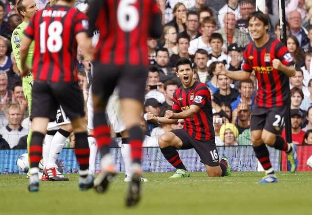 Sergio Kun Agüero of Manchester City celebrates scoring his side s first goal during the Premier League match between Fulham and Manchester City at Craven Cottage, London, England, on September 18, 2011 - Fulham FC - Manchester City - EDITORIAL USE ONLY. No use with unauthorised audio, video, data, fixture lists, club league logos or live services. Online in-match use limited to 120 images, no video emulation. No use in betting, games or single club league player publications.