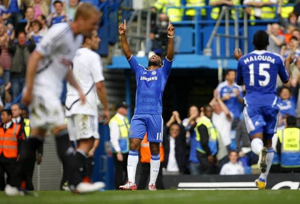 Didier Drogba of Chelsea celebrates scoring his side s fourth goal during the Premier League match between Chelsea and Swansea City at Stamford Bridge, London, England, on September 24, 2011. Photo Credit SPORTIMAGE JAKE BADGER Barclays Premier League Chelsea v Swansea City 24th September, 2011 EDITORIAL USE ONLY. No use with unauthorised audio, video, data, fixture lists, club league logos or live services. Online in-match use limited to 120 images, no video emulation. No use in betting, games or single club league player publications.