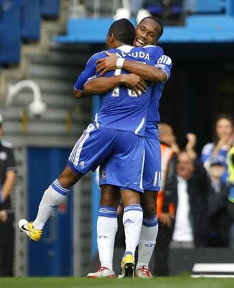 Didier Drogba of Chelsea celebrates scoring his side s fourth goal with Florent Malouda of Chelsea during the Premier League match between Chelsea and Swansea City at Stamford Bridge, London, England, on September 24, 2011. Photo Credit SPORTIMAGE JAKE BADGER Barclays Premier League Chelsea v Swansea City 24th September, 2011 EDITORIAL USE ONLY. No use with unauthorised audio, video, data, fixture lists, club league logos or live services. Online in-match use limited to 120 images, no video emulation. No use in betting, games or single club league player publications.