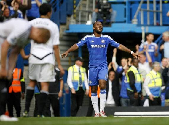 Didier Drogba of Chelsea celebrates scoring his side s fourth goal during the Premier League match between Chelsea and Swansea City at Stamford Bridge, London, England, on September 24, 2011. Photo Credit SPORTIMAGE JAKE BADGER Barclays Premier League Chelsea v Swansea City 24th September, 2011 EDITORIAL USE ONLY. No use with unauthorised audio, video, data, fixture lists, club league logos or live services. Online in-match use limited to 120 images, no video emulation. No use in betting, games or single club league player publications.