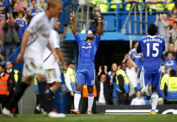 Didier Drogba of Chelsea celebrates scoring his side s fourth goal during the Premier League match between Chelsea and Swansea City at Stamford Bridge, London, England, on September 24, 2011. Photo Credit SPORTIMAGE JAKE BADGER Barclays Premier League Chelsea v Swansea City 24th September, 2011 EDITORIAL USE ONLY. No use with unauthorised audio, video, data, fixture lists, club league logos or live services. Online in-match use limited to 120 images, no video emulation. No use in betting, games or single club league player publications.