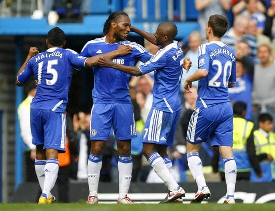 Didier Drogba of Chelsea celebrates scoring his side s fourth goal during the Premier League match between Chelsea and Swansea City at Stamford Bridge, London, England, on September 24, 2011. Photo Credit SPORTIMAGE JAKE BADGER Barclays Premier League Chelsea v Swansea City 24th September, 2011 EDITORIAL USE ONLY. No use with unauthorised audio, video, data, fixture lists, club league logos or live services. Online in-match use limited to 120 images, no video emulation. No use in betting, games or single club league player publications.