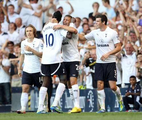Tottenhams Kyle Walker celebrates scoring his sides second goal with Emmanuel Adebayor Barclays Premier League - Tottenham Hotspur vs. Arsenal FC London - 2nd October, 2011 EDITORIAL USE ONLY. No use with unauthorised audio, video, data, fixture lists, club league logos or live services. Online in-match use limited to 120 images, no video emulation. No use in betting, games or single club league player publications.