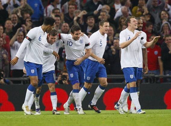 Frank Lampard of England celebrates scoring his side s first goal during the friendly match between England and Spain at Wembley Stadium, London, England, on November 12, 2011 International Friendly England v Spain 12th November, 2011 EDITORIAL USE ONLY. No use with unauthorised audio, video, data, fixture lists, club league logos or live services. Online in-match use limited to 120 images, no video emulation. No use in betting, games or single club league player publications.