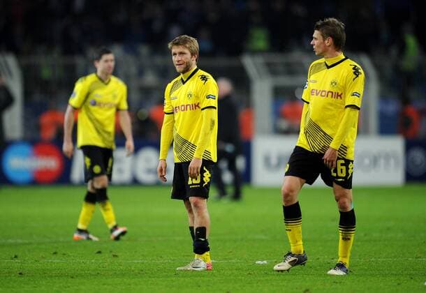FUSSBALL CHAMPIONS LEAGUE SAISON 2011 2012 Borussia Dortmund - Olympique Marseille 06.12.2011 Robert Lewandowski, Jakub KUBA Blaszczykowski und Lukasz Piszczek (v.l., alle Borussia Dortmund) sind nach dem Abpfiff enttaeuscht