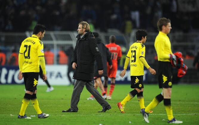 FUSSBALL CHAMPIONS LEAGUE SAISON 2011 2012 Borussia Dortmund - Olympique Marseille 06.12.2011 Ilkay Guendogan, Trainer Juergen Klopp, Shinji Kagawa und Lukasz Piszczek (v.l., alle Borussia Dortmund) sind nach dem Abpfiff enttaeuscht