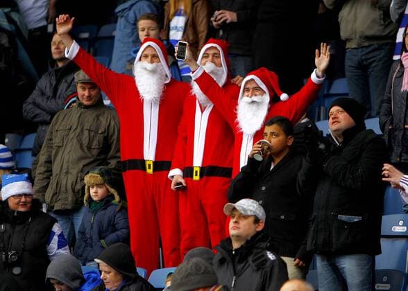 Queens Park Rangers fans get into the Christmas spirit during the Premier League match of QPR Queens Park Rangers at Loftus Road, London, England, on December 18, 2011 Barclays Premier League 18th December, 2011 EDITORIAL USE ONLY. No use with unauthorised audio, video, data, fixture lists, club league logos or live services. Online in-match use limited to 120 images, no video emulation. No use in betting, games or single club league player publications.