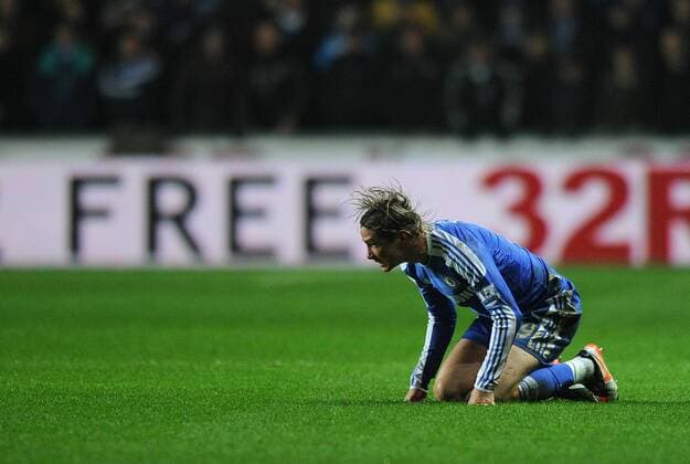 Football - Premier League - Swansea City vs. Chelsea FC - Chelsea s Fernando Torres reacts having been fouled by Ashley Williams of Swansea City at the Liberty Stadium, Swansea