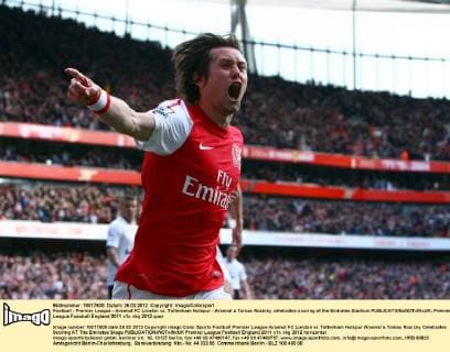 Football - Premier League - Arsenal FC London vs. Tottenham Hotspur - Arsenal s Tomas Rosicky celebrates scoring at the Emirates Stadium