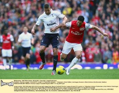 Football - Premier League - Arsenal FC London vs. Tottenham Hotspur - Tottenham s Kyle Walker challenges Arsenal s Mikel Arteta at the Emirates Stadium