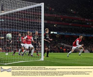 Arsenals Laurent Koscielny scoring his sides opening goal Arsenal v AC Milan, UEFA Champions League, Knockout round, Second Leg at the Emirates, London. 6th March 2012 EDITORIAL USE ONLY. No use with unauthorised audio, video, data, fixture lists, club league logos or live services. Online in-match use limited to 120 images, no video emulation. No use in betting, games or single club league player publications.