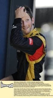 Romain GROSJEAN (FRA),Lotus F1 Team,Aktion,Einzelbild,angeschnittenes Einzelmotiv,Halbfigur,halbe Figur, Formel 1,Qualifying zum GP von Australien,Grand Prix Melbourne,Albert Park,Saison2012,