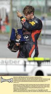 Sebastian VETTEL (GER),Red Bull Racing,Aktion,Einzelbild,angeschnittenes Einzelmotiv,Halbfigur,halbe Figur, nach dem Qualifying. Motorsport:Formel 1,Qualifying zum GP von Malaysia auf dem Sepang Circuit,Kuala Lumpur,Saison2012,