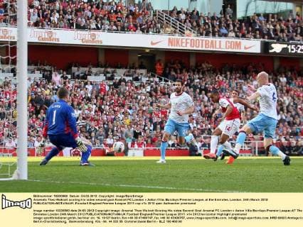 Arsenals Theo Walcott scoring his sides second goal Arsenal FC London v Aston Villa, Barclays Premier League, at the Emirates, London. 24th March 2012 EDITORIAL USE ONLY. No use with unauthorised audio, video, data, fixture lists, club league logos or live services. Online in-match use limited to 120 images, no video emulation. No use in betting, games or single club league player publications.