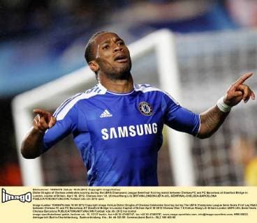 Didier Drogba of Chelsea celebrates scoring during the UEFA Champions League Semifinal first leg match between Chelsea FC and FC Barcelona at Stamford Bridge in London, capital of Britain, April 18, 2012. Chelsea won 1-0. (Xinhua Wang Lili) BRITAIN-LONDON-UEFA-UCL-SEMIFINAL-CHELSEA-BARCELONA