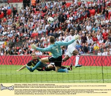 Englands Danny Welbeck scoring his sides opening goal..International Friendly match Wembley Stadium, London on the 2nd June 2012. Pic David Klein SPORTIMAGE EDITORIAL USE ONLY. No use with unauthorised audio, video, data, fixture lists, club league logos or live services. Online in-match use limited to 120 images, no video emulation. No use in betting, games or single club league player publications.