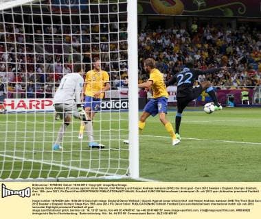 Englands Danny Welbeck (R) scores against Jonas Olsson, Olof Melberg and Keeper Andreas Isaksson (SWE) the third goal - Euro 2012 Sweden v England, Olympic Stadium, Kiev, 15th June 2012. Pic David Klein SPORTIMAGE EDITORIAL USE ONLY. No use with unauthorised audio, video, data, fixture lists, club league logos or live services. Online in-match use limited to 120 images, no video emulation. No use in betting, games or single club league player publications.