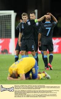 Englands Steven Gerrard celebrates at the final whistle..Euro 2012 Sweden v England, Olympic Stadium, Kiev, 15th June 2012. Pic David Klein SPORTIMAGE... EDITORIAL USE ONLY. No use with unauthorised audio, video, data, fixture lists, club league logos or live services. Online in-match use limited to 120 images, no video emulation. No use in betting, games or single club league player publications.
